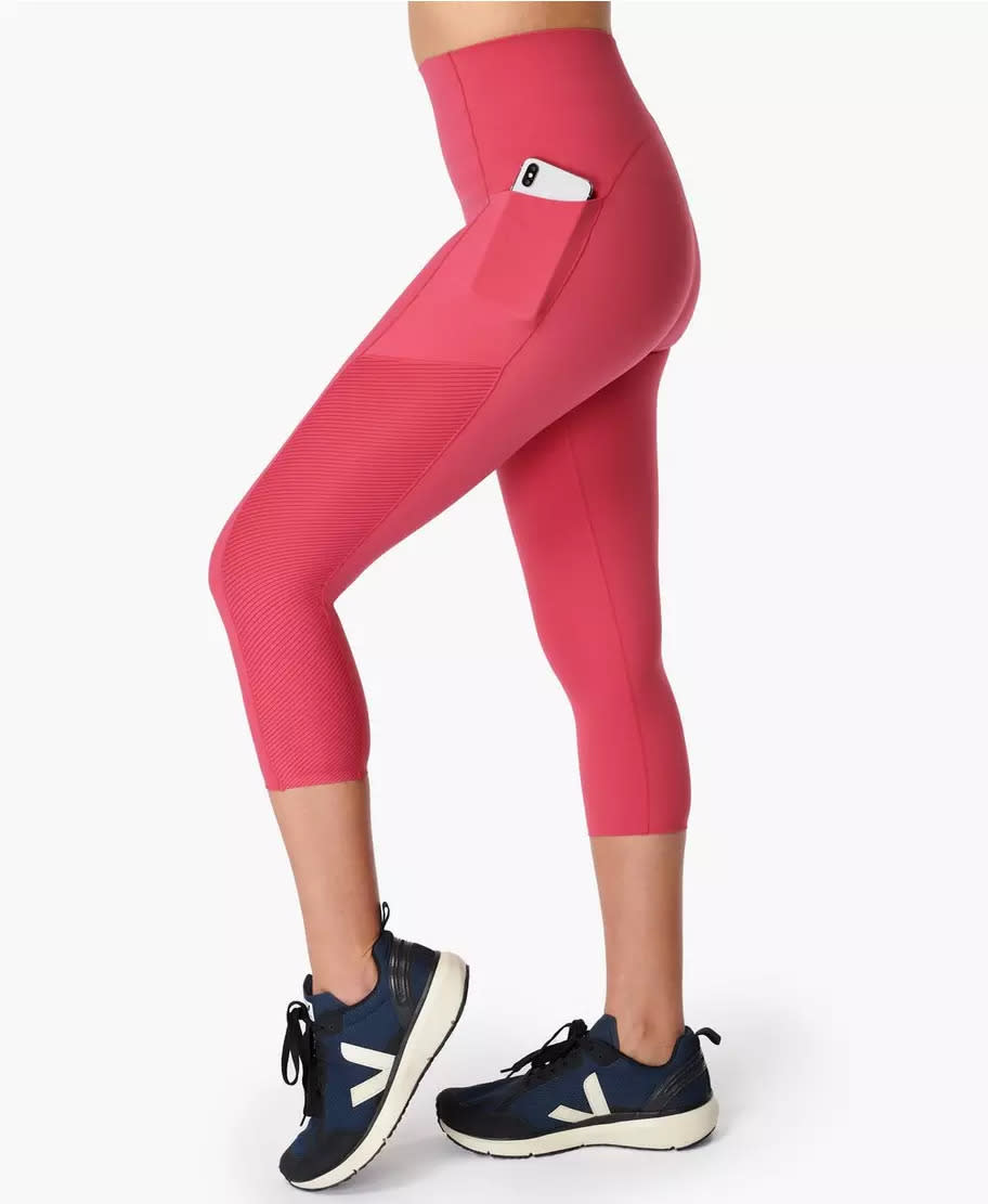 Power High-Waisted Cropped Workout Leggings. Image via Sweaty Betty.