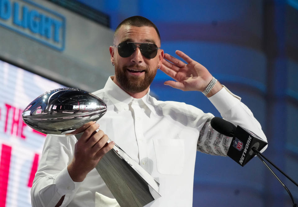 Apr 27, 2023; Kansas City, MO, USA; Kansas City Chiefs tight end Travis Kelce greets fans during the first round of the 2023 NFL Draft at Union Station. Mandatory Credit: Kirby Lee-USA TODAY Sports