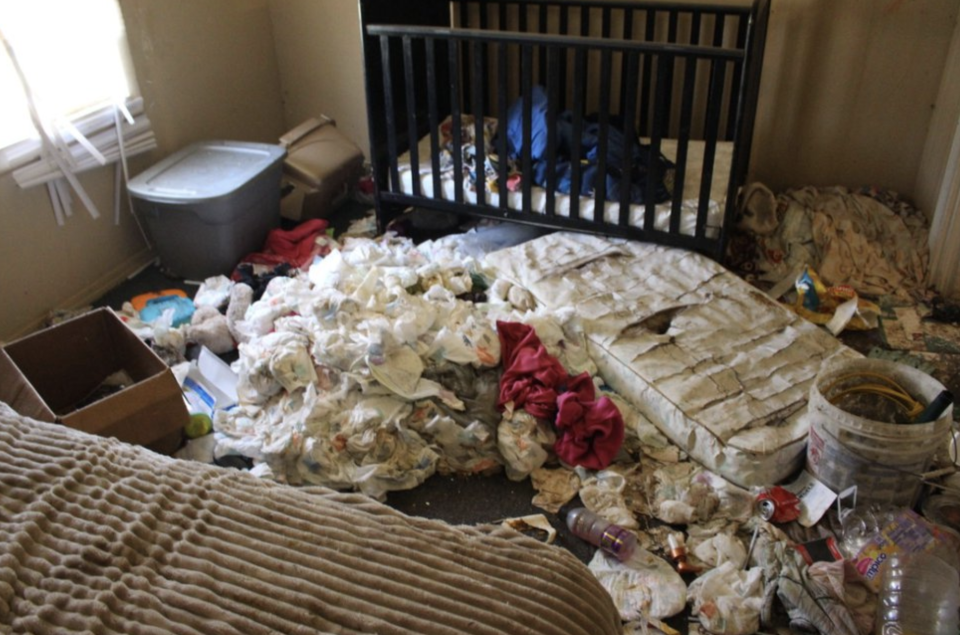 Scores of used nappies are located next to a cot in the home. Source: Poplar Bluff Police Department