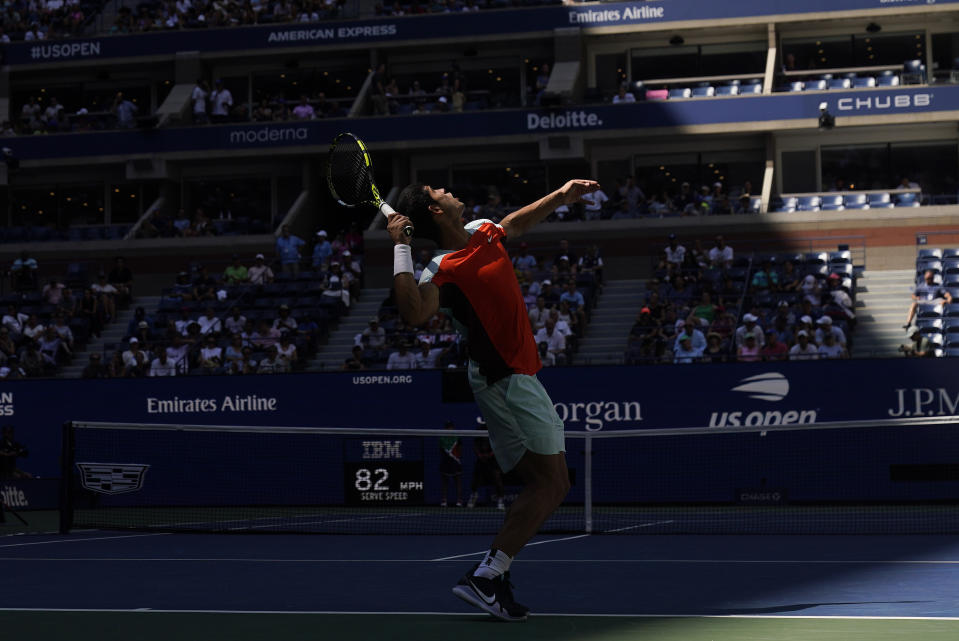 Carlos Alcaraz, of APTOPSpain, serves to Sebastian Baez, of Argentina, during the first round of the US Open tennis championships, Tuesday, Aug. 30, 2022, in New York. (AP Photo/Seth Wenig)