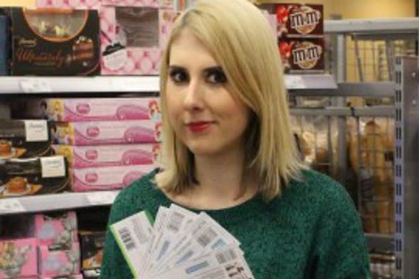 Holly Smith with some money-saving coupons.