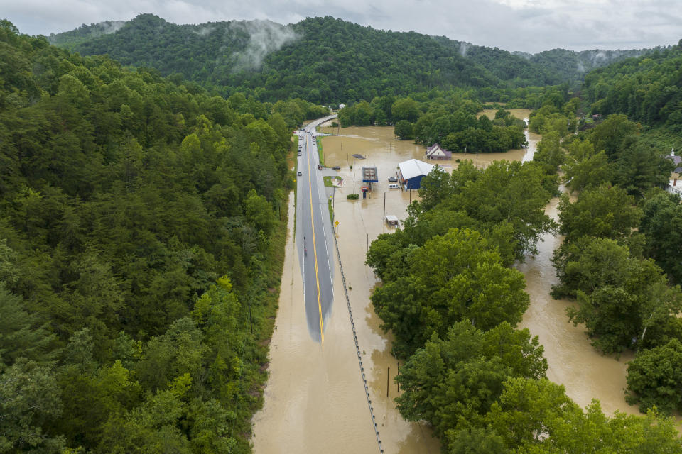 Buildings and roads are flooded near Lost Creek, Ky., Thursday, July 28, 2022. Heavy rains have caused flash flooding and mudslides as storms pound parts of central Appalachia. Kentucky Gov. Andy Beshear says it's some of the worst flooding in state history. (Ryan C. Hermens/Lexington Herald-Leader via AP)