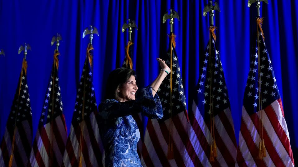 Haley waves to the audience as she speaks at a New Hampshire primary night rally, in Concord, New Hampshire, on Tuesday. - Charles Krupa/AP