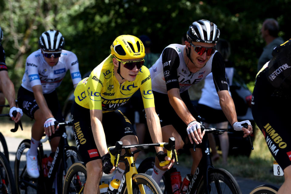 BOURGENBRESSE FRANCE  JULY 20 LR Jonas Vingegaard of Denmark and Team JumboVisma  Yellow leader jersey and Mikkel Bjerg of Denmark and UAE Team Emirates compete during the stage eighteen of the 110th Tour de France 2023 a 1849km stage from Motiers to BourgenBresse  UCIWT  on July 20 2023 in BourgenBresse France Photo by Michael SteeleGetty Images