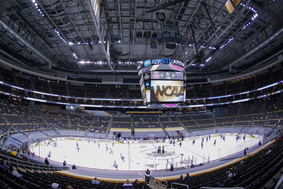 St. Cloud State and Minnesota State players warm up for a semifinal in the NCAA men's Frozen Four hockey tournament in Pittsburgh, Thursday, April 8, 2021,. (AP Photo/Keith Srakocic)