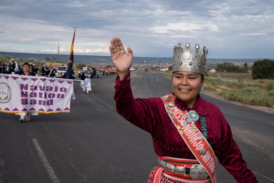 Miss Navajo Nation Valentina Clitso waves to the crowd during the Navajo Nation Code Talkers Day parade on Aug. 14, 2023, in Window Rock.