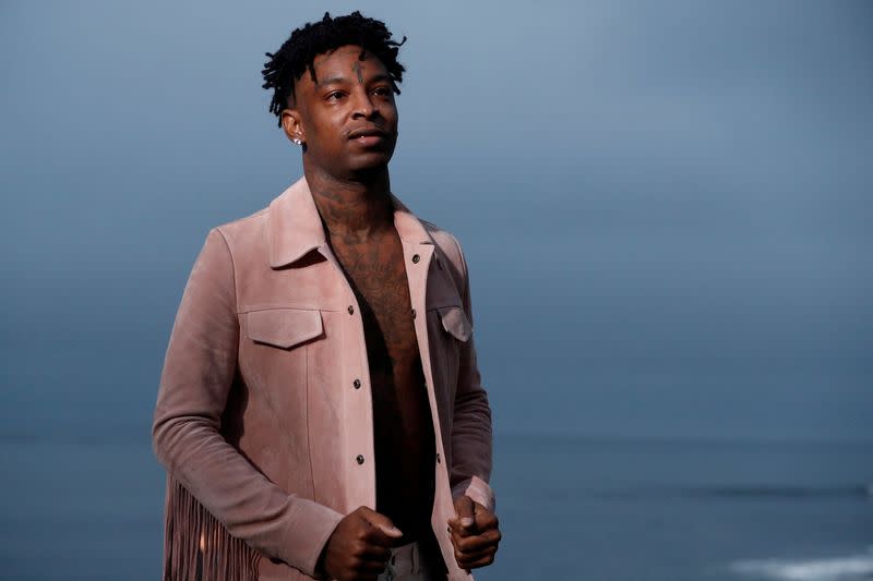 FILE PHOTO: Rapper 21 Savage looks on at the Saint Laurent Men’s Spring/Summer 2020 fashion show at Paradise Cove beach in Malibu