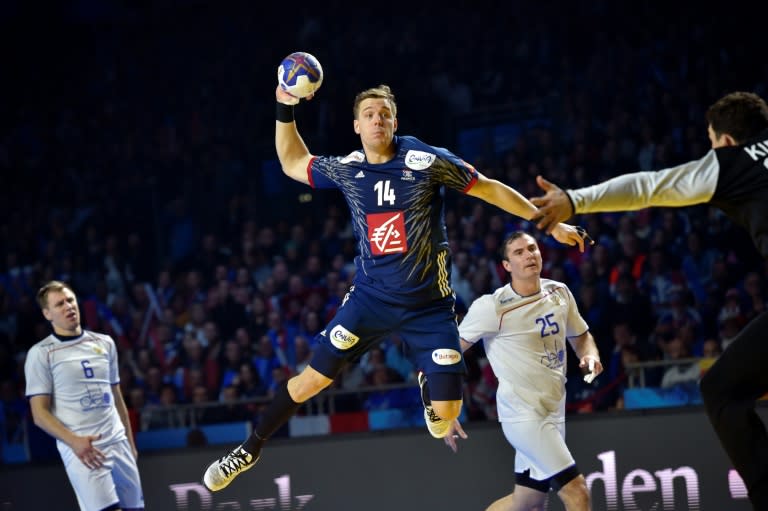 France's left wing Kentin Mahe jumps to shoot on goal during the 25th IHF Men's World Championship 2017 Group A handball match Russia vs France on January 17, 2017 at the Parc des Expositions in Nantes