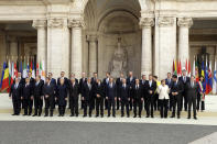 European Union heads of state pose for a group photo in the Cortile di Michelangelo during an EU summit in Rome on Saturday, March 25, 2017. EU leaders were gathering in Rome to mark the 60th anniversary of their founding treaty and chart a way ahead following the decision of Britain to leave the 28-nation bloc. (AP Photo/Andrew Medichini)