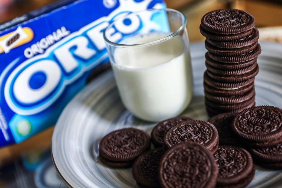 Oreo cookies on a plate, a glass of milk and Oreo packaging are seen in this illustration photo taken in Krakow, Poland on September 25, 2021. (Photo by Jakub Porzycki/NurPhoto via Getty Images)