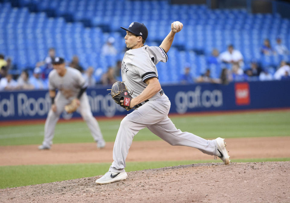 Sep 14, 2019; Toronto, Ontario, CAN; New York Yankees relief pitcher Ryan Dull (73) throws a pitch during the ninth inning against the Toronto Blue Jays at Rogers Centre. Mandatory Credit: Nick Turchiaro-USA TODAY Sports