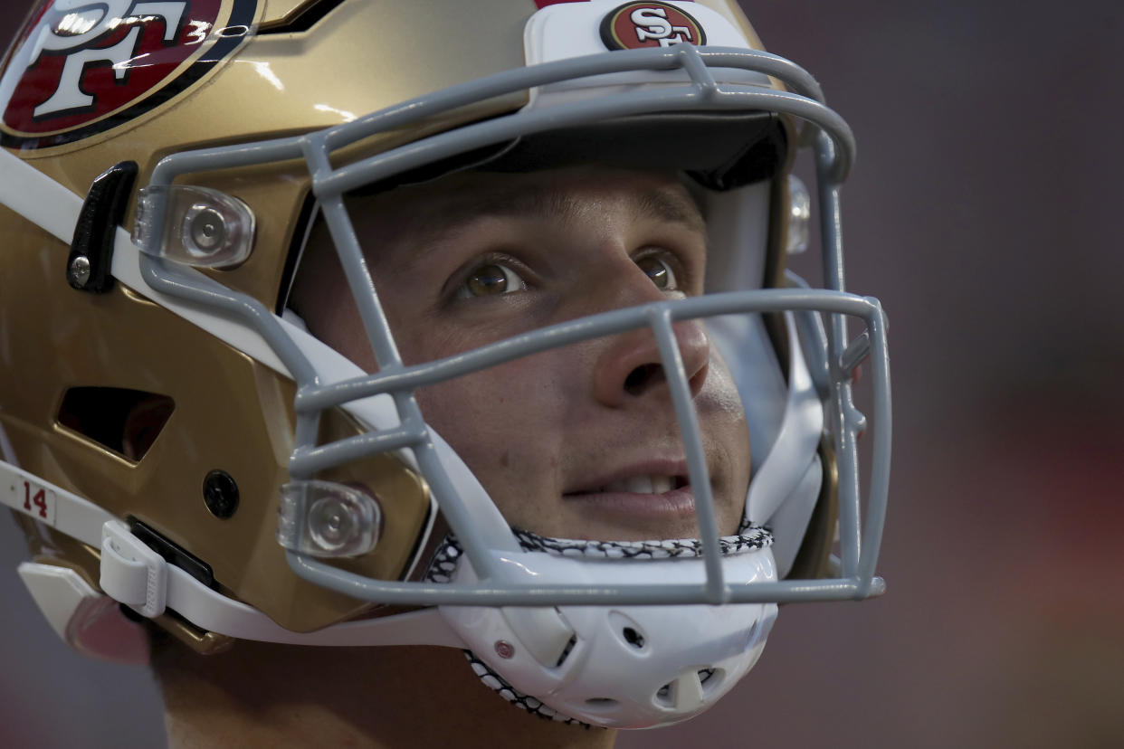 San Francisco 49ers quarterback Brock Purdy (14) stands on the sideline during an NFL preseason football game against the Green Bay Packers, Friday, Aug. 12, 2022, in Santa Clara, Calif. (AP Photo/Scot Tucker)