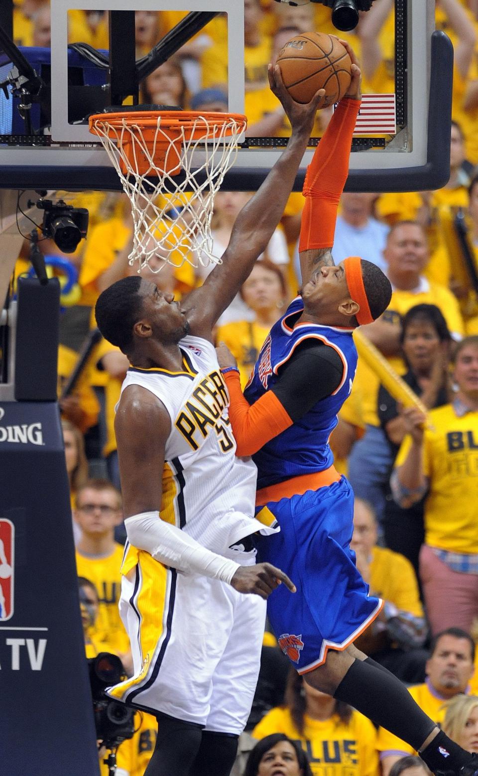 Roy Hibbert (All-Star in 2011-12, 13-14) blocks a dunk attempt by Carmelo Anthony of the Knicks in Game 6 of the Eastern Conference semifinals on May 18, 2013.