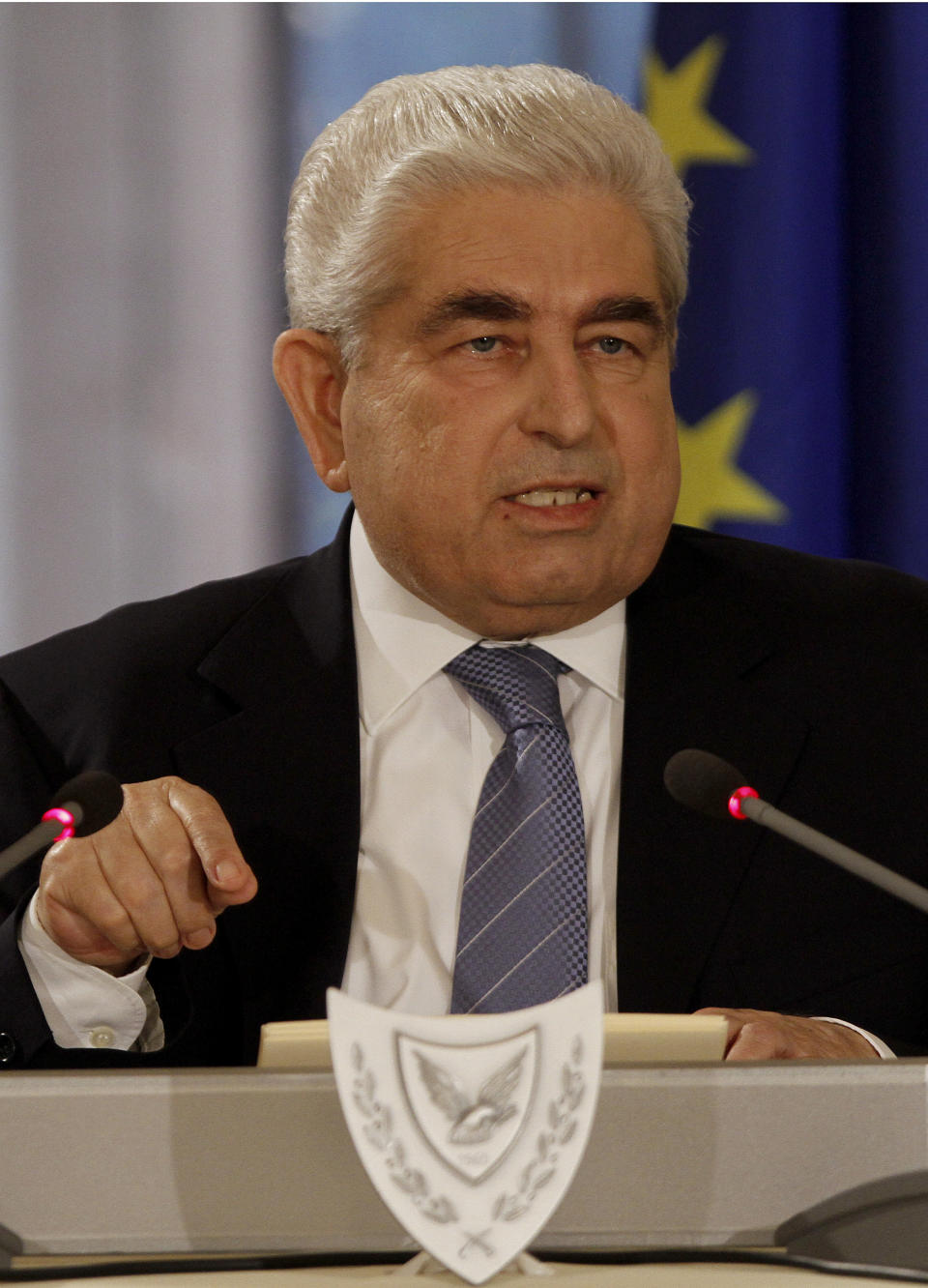 Cypriot President Dimitris Christofias makes his statement to the media at the presidential palace in Nicosia, Cyprus, Friday, June 1, 2012. The president says he has tasked officials to draw up plans on how the country would deal with Greece's possible exit from the eurozone. Christofias told a news conference that conditions would be "chaotic" if debt-drowned Greece quits the euro and that the impact of such a move would be felt not only by all other countries using the currency, but all of Europe. (AP Photo/Petros Karadjias)