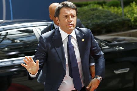 Italian Prime Minister Matteo Renzi arrives at the European Union (EU) Council headquarters at the start of an EU leaders summit in Brussels, Belgium, June 25, 2015. REUTERS/Darren Staples