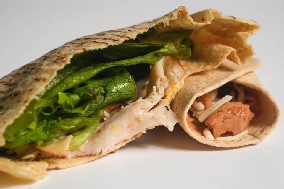 Wrap and roll: Stuff a whole wheat pita with turkey, lettuce and mustard, or wrap up fat-free refried beans with a low-fat cheese in a whole wheat tortilla.