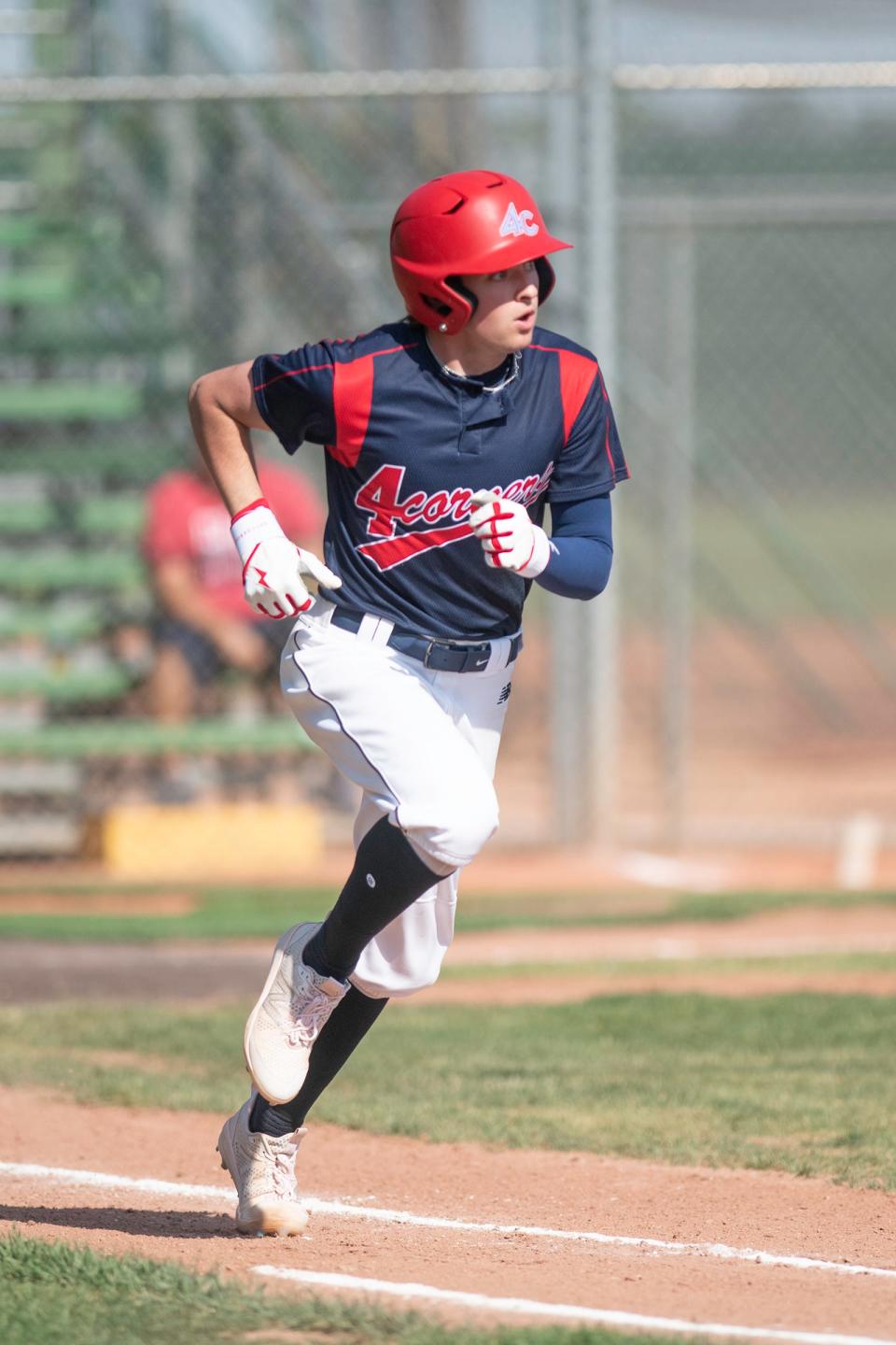 Bryant Elliot runs to first base during a day one game against Cherry Creek at the annual Andenucio Memorial Baseball Tournament on Thursday, June 16, 2022.