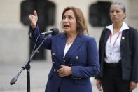 Peru's new President Dina Boluarte makes a statement to the press at the government palace in Lima, Peru, Thursday, Dec. 8, 2022. Peru's Congress voted to remove President Pedro Castillo from office Wednesday and replace him with the vice president, Boluarte, shortly after Castillo tried to dissolve the legislature ahead of a scheduled vote to remove him. (AP Photo/Fernando Vergara)