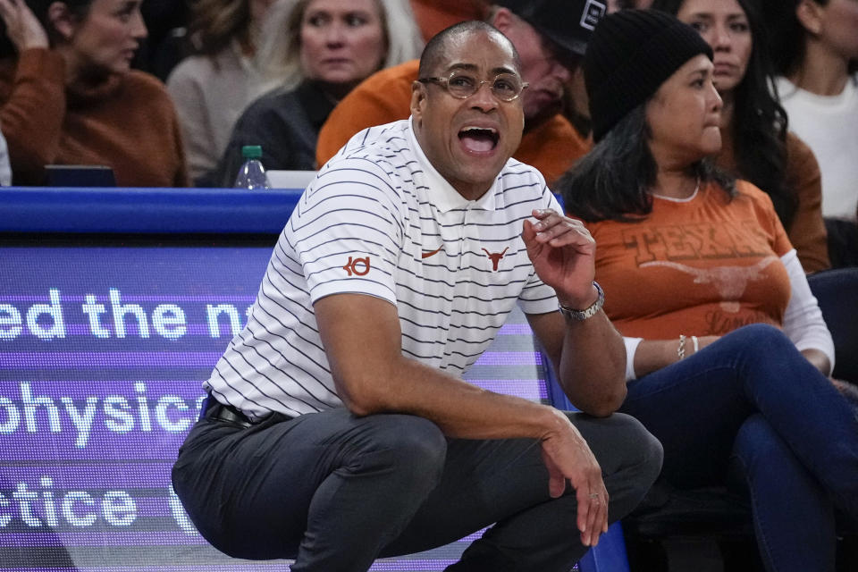 Texas head coach Rodney Terry calls to his players during the first half of an NCAA college basketball game against UConn in the final of the Empire Classic tournament Monday, Nov. 20, 2023, in New York. (AP Photo/Frank Franklin II)