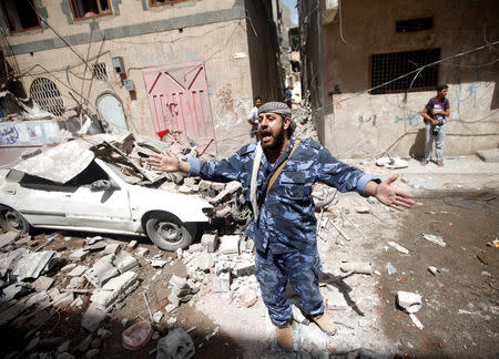 A Houthi security officer reacts at the site of an air strike launched by the Saudi-led coalition in Sanaa, Yemen May 16, 2019. REUTERS/Mohamed al-Sayaghi