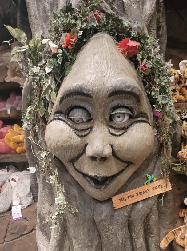 "Tracy Tree," a talking tree at the Rainforest Cafe that looks very sickly and its eyes are rolling in two different directions