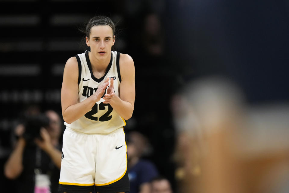 Iowa guard Caitlin Clark (22) reacts during the first half of an NCAA college basketball game against Penn State, Thursday, Feb. 8, 2024, in Iowa City, Iowa. (AP Photo/Charlie Neibergall)
