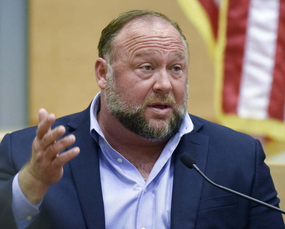 FILE - Conspiracy theorist Alex Jones takes the witness stand to testify at the Sandy Hook defamation damages trial at Connecticut Superior Court in Waterbury, Conn. Thursday, Sept. 22, 2022. (Tyler Sizemore/Hearst Connecticut Media via AP, Pool, File)