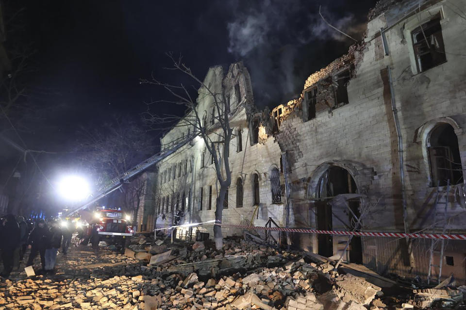 In this photo provided by the Kharkiv Regional Administration, an apartment building damaged in a Russian rocket attack is seen in Kharkiv, Ukraine, in the early hours of Wednesday, Jan. 17, 2024. (Kharkiv Regional Administration via AP)