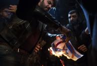 <p>Protestors burn Israeli flag and shout slogans against President Donald Trump during a protest against the Israel in front of U.S. Consulate in Istanbul, Turkey, Dec. 6, 2017. (Photo:Tolga Bozoglu/EPA-EFE/REX/Shutterstock) </p>