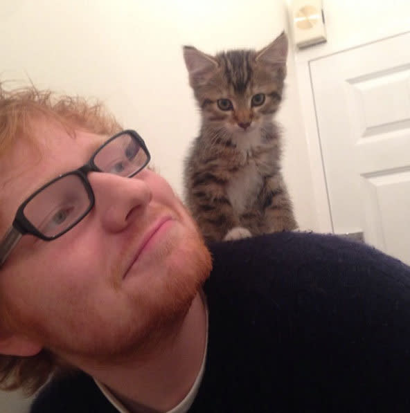 <strong>10. Literally every single time he's been photographed with his cat</strong>  There is so much to love in this photo, we're not even sure where to start.