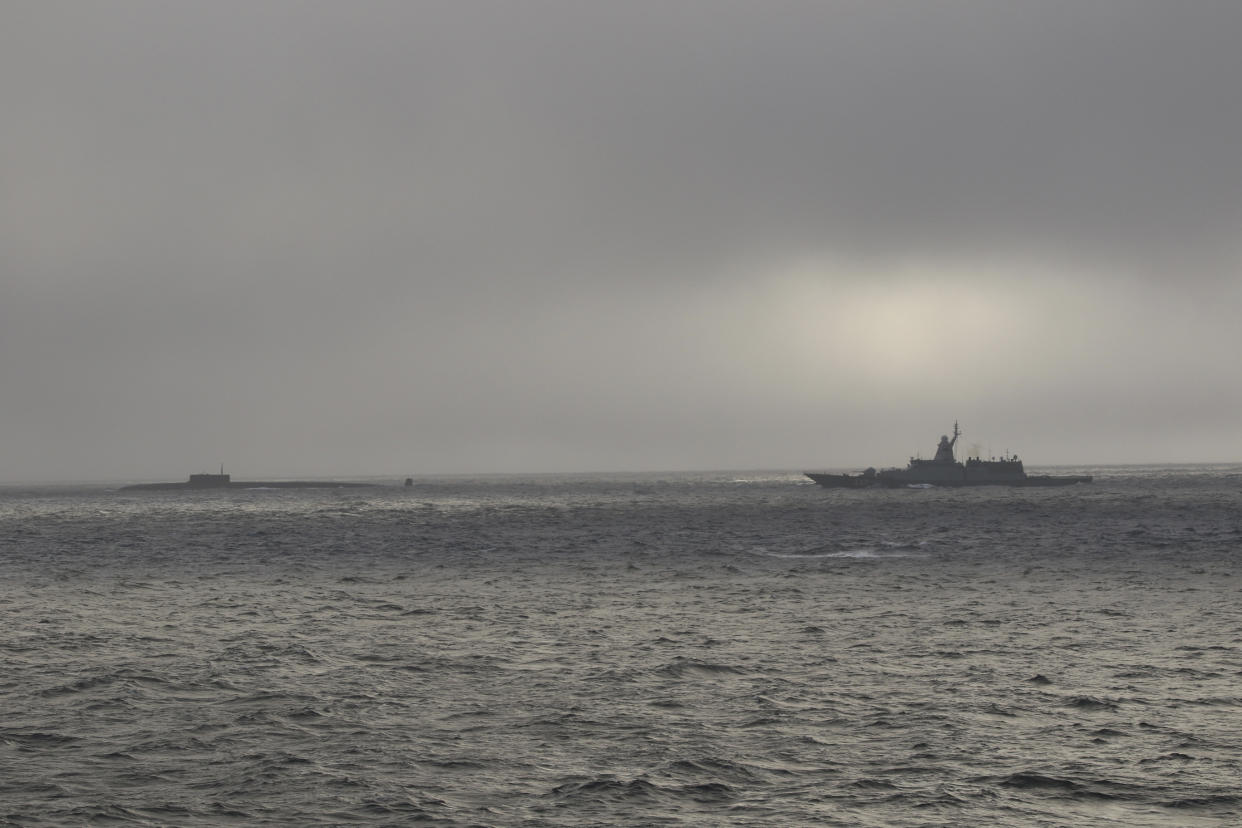 In this image released by the U.S Coast Guard, the U.S. Coast Guard Cutter Stratton, right, shadows a Russian submarine about 57 miles northwest of Point Hope, Alaska on Sept. 15, 2024. ( U.S Coast Guard via AP)