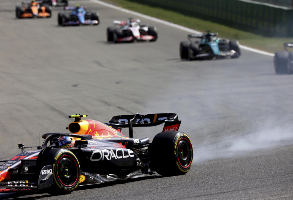 Red Bull driver Sergio Perez of Mexico steers his car during the Formula One Grand Prix at the Spa-Francorchamps racetrack in Spa, Belgium, Sunday, Aug. 28, 2022. (AP Photo/Olivier Matthys)