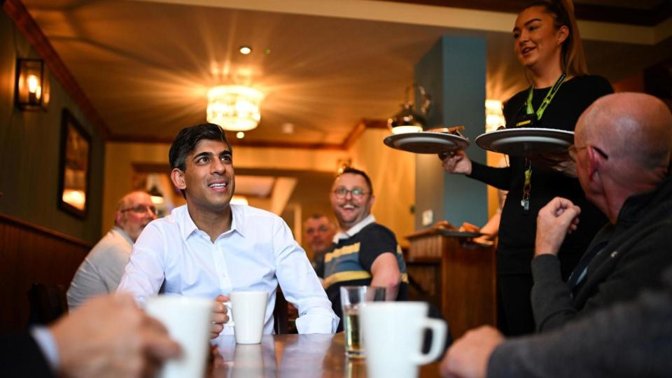 Rishi Sunak drinking a coffee