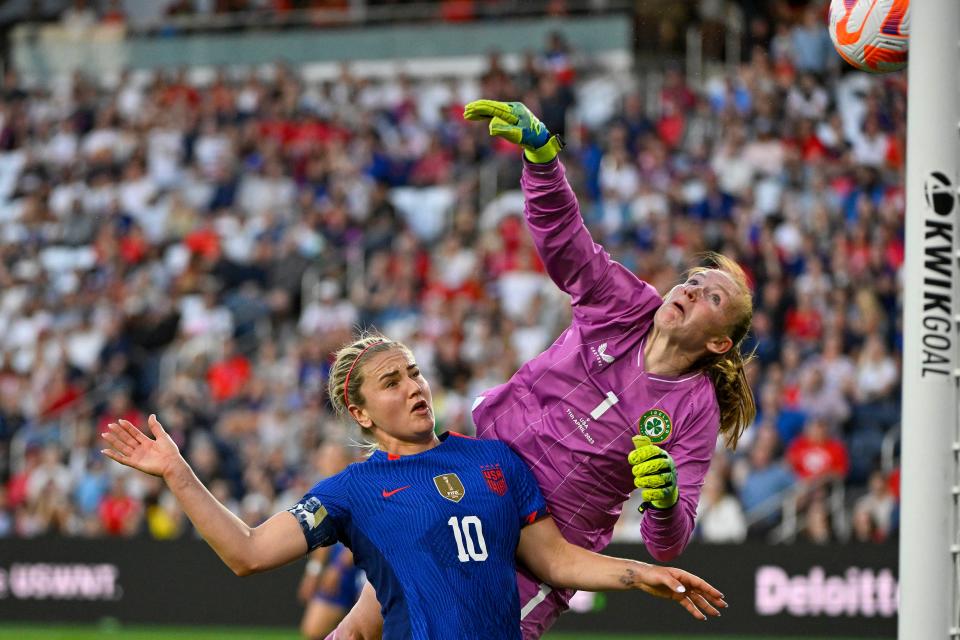 Republic of Ireland goalkeeper Courtney Brosnan (1) is unable to save a shot by Alana Cook as teammate Lindsey Horan (10) looks on.