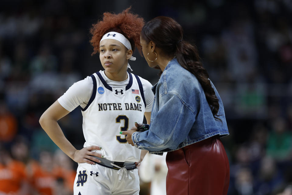 ALBANY, NEW YORK - MARCH 29: Hannah Hidalgo #3 of the Notre Dame Fighting Irish speaks to head coach Niele Ivey against the Oregon State Beavers during the second half in the Sweet 16 round of the NCAA Women's Basketball Tournament at MVP Arena on March 29, 2024 in Albany, New York. (Photo by Sarah Stier/Getty Images)