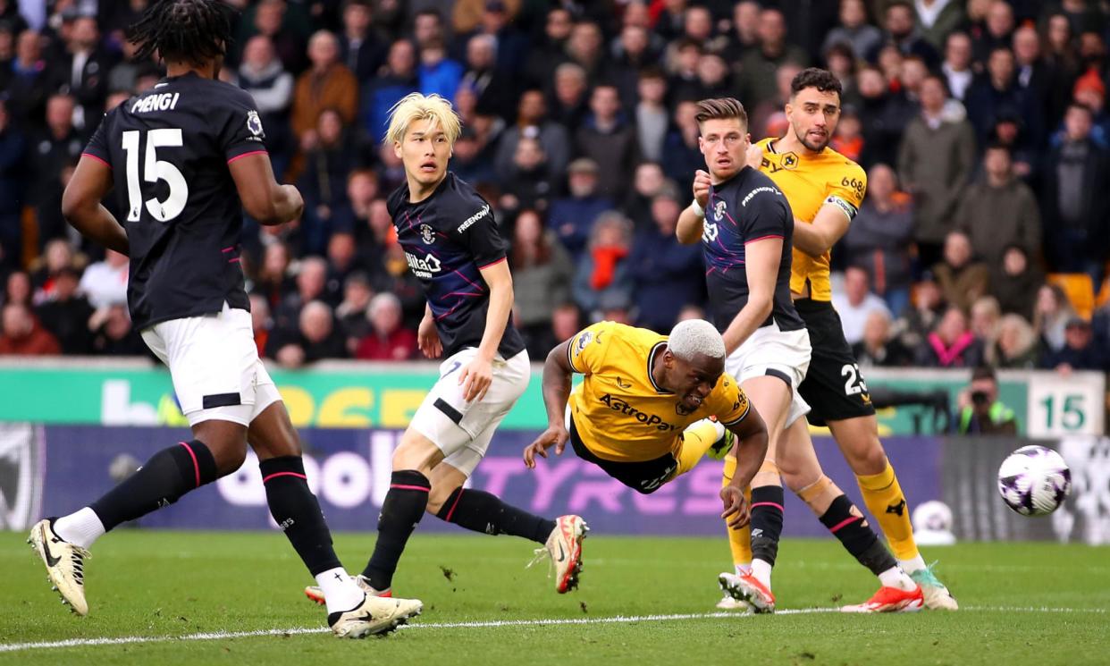 <span>Toti Gomes stoops to convert Mario Lemina’s cross to double Wolves’ lead at the start of the second half.</span><span>Photograph: Jack Thomas/WWFC/Wolves/Getty Images</span>