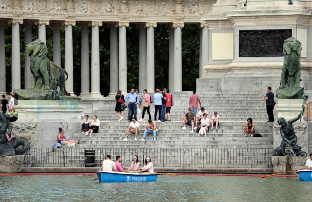 PHOTO: People have a break and some row in a boat on the Retiro park&#39;s lake in central Madrid, as Spaniards are bracing themselves for an early heat wave, on April 25, 2023. (Thomas Coex/AFP via Getty Images, FILE)