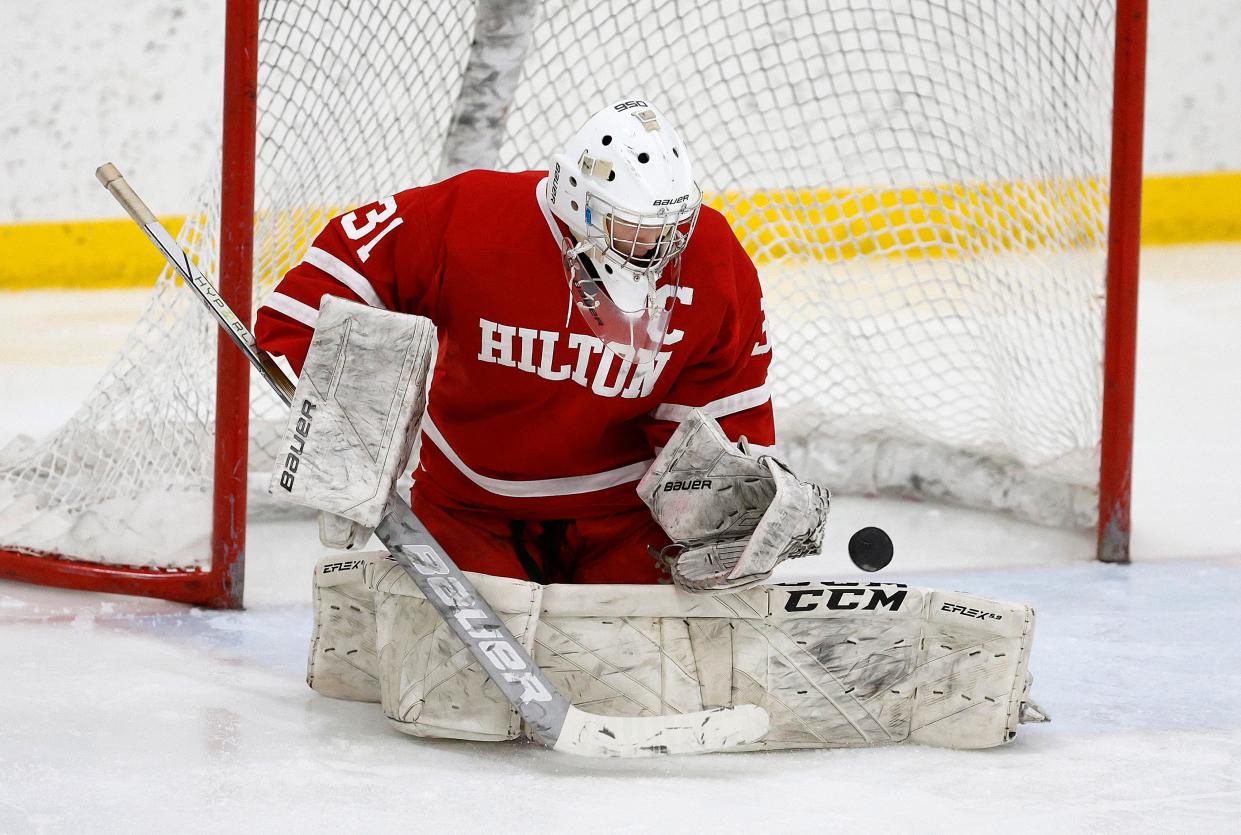 Hilton goalie Aiden Hill makes a stop on this shot against Penfield.