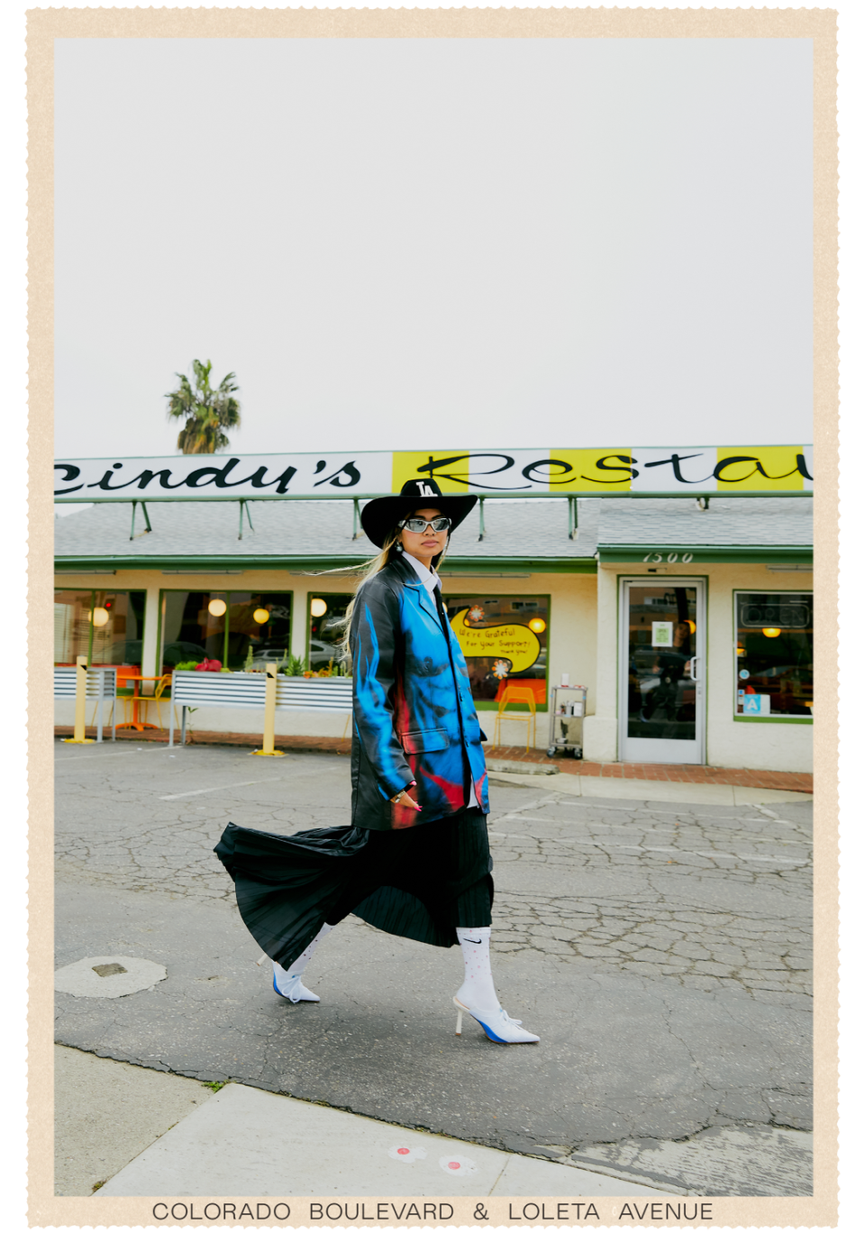 Ann-Marie Hoang walks in front of Cindy's diner.