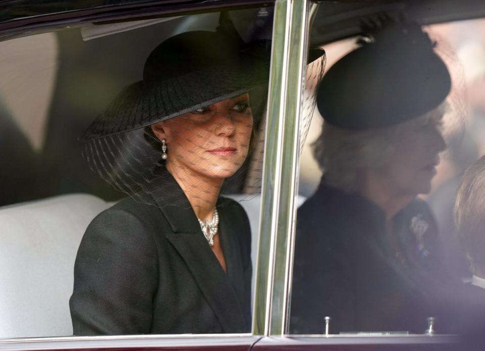 The Princess of Wales wore a black coat dress and pearl choker (Tim Goode/PA) (PA Wire)