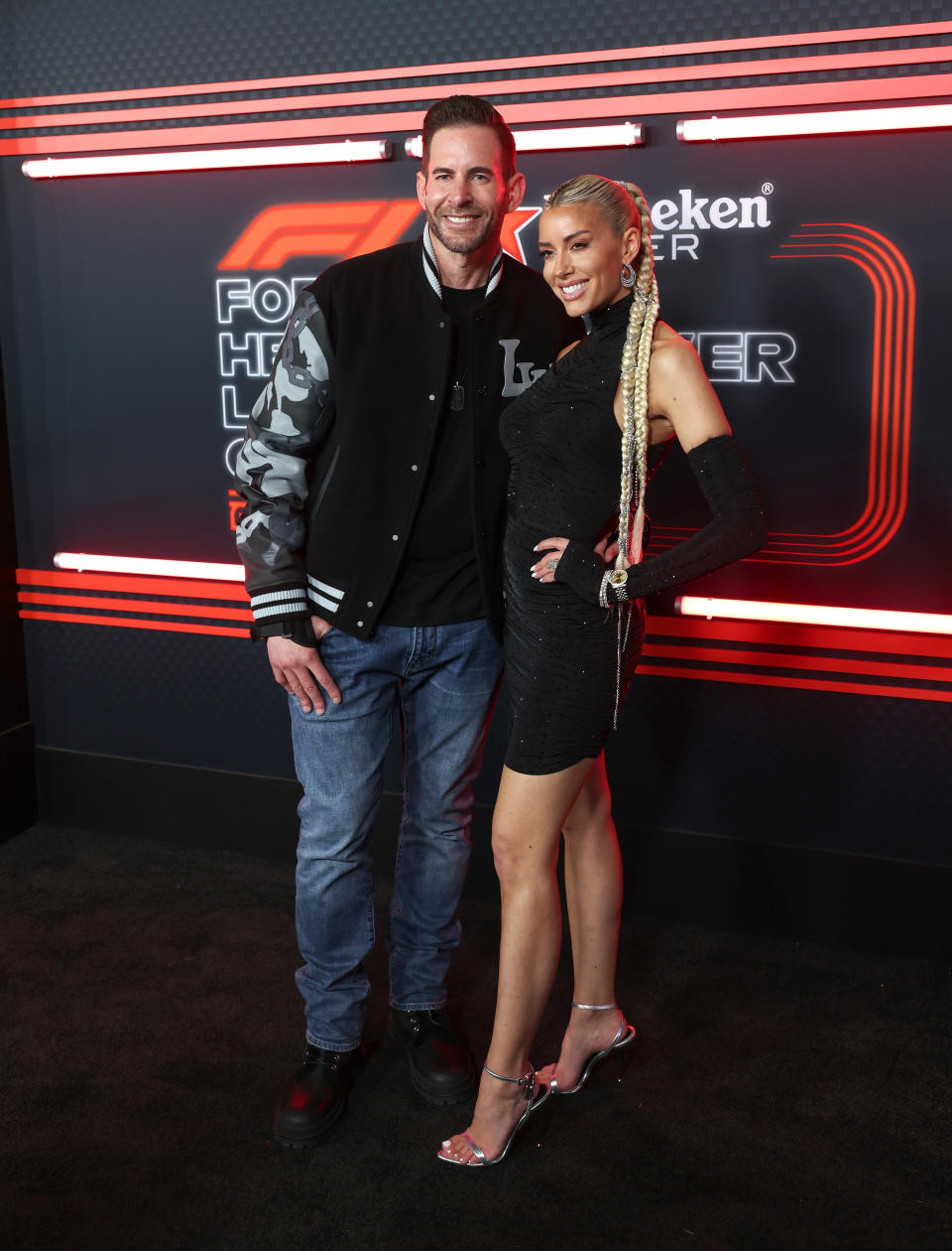 Heather Ray Young, Tarek El Moussa at the Formula 1 Heineken Silver Las Vegas Grand Prix on November 18, 2023 at the Paddock Entryway in Las Vegas, Nevada. (Photo by Paul Citone/Variety via Getty Images)