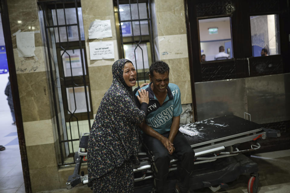 Palestinians react after their relative was killed in Israeli bombardment of the Gaza Strip at a hospital in Khan Younis, Thursday, June. 27, 2024. (AP Photo/Jehad Alshrafi)