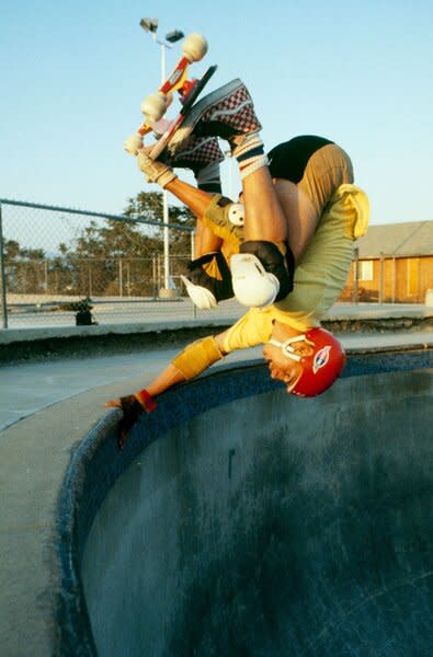 A skateboarder does an invert in the round pool section of the combi pool at the Upland Skate Park in August 1984.