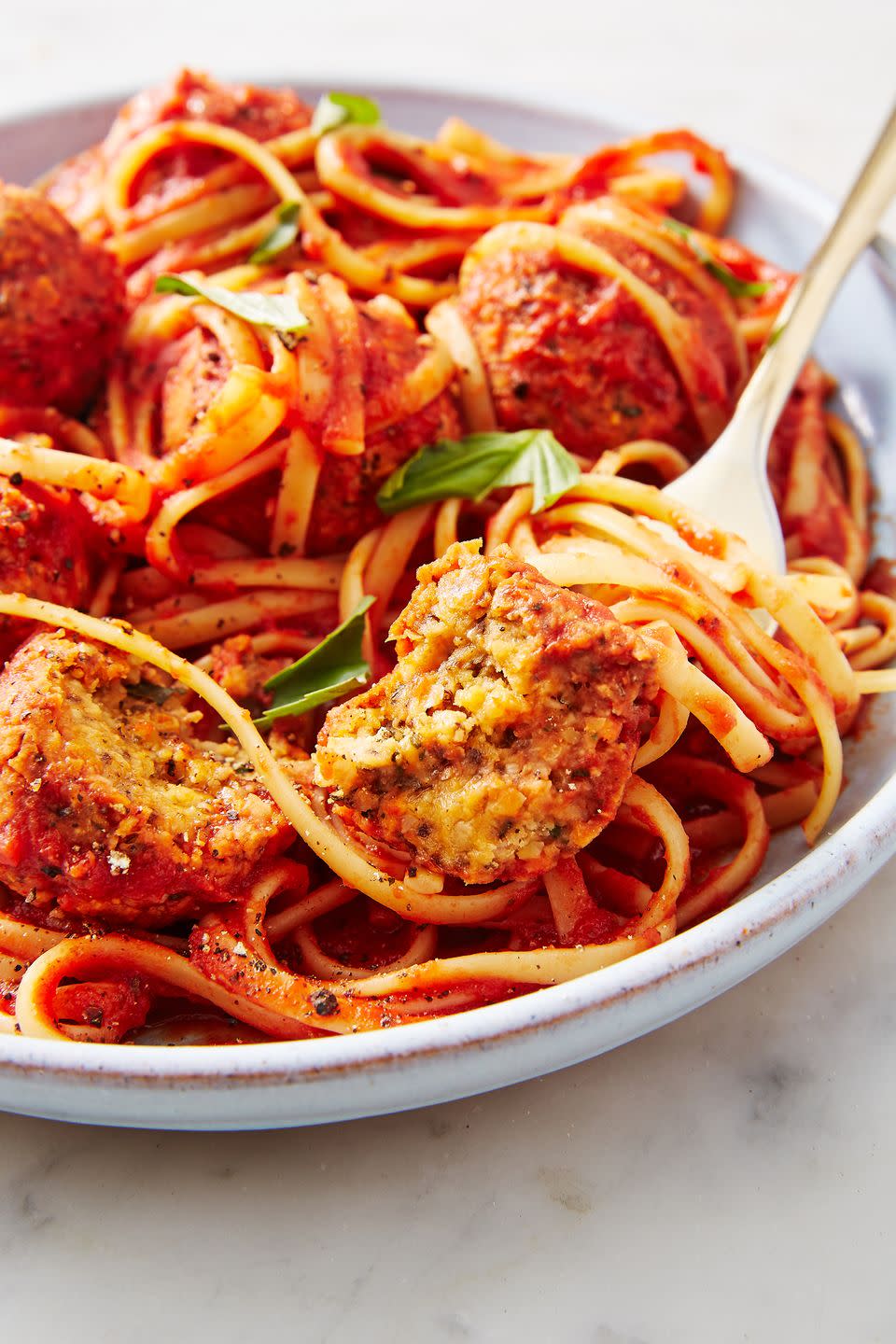 <p>Few comfort foods satisfy like a hearty bowl of <a href="https://www.delish.com/cooking/recipe-ideas/recipes/a55764/best-spaghetti-and-meatballs-recipe/" rel="nofollow noopener" target="_blank" data-ylk="slk:spaghetti and meatballs;elm:context_link;itc:0;sec:content-canvas" class="link ">spaghetti and meatballs</a>. Now <em>everyone</em> can enjoy this comfort, sans meat! These <a href="https://www.delish.com/cooking/recipe-ideas/g40692357/chickpea-recipes/" rel="nofollow noopener" target="_blank" data-ylk="slk:chickpea;elm:context_link;itc:0;sec:content-canvas" class="link ">chickpea</a>-based meatballs pack tons of flavor, come together quickly, and even provide a good amount of protein and fiber.</p><p>Get the <strong><a href="https://www.delish.com/cooking/recipe-ideas/a28708508/vegan-meatballs-recipe/" rel="nofollow noopener" target="_blank" data-ylk="slk:Vegan Meatballs recipe;elm:context_link;itc:0;sec:content-canvas" class="link ">Vegan Meatballs recipe</a></strong>.</p>