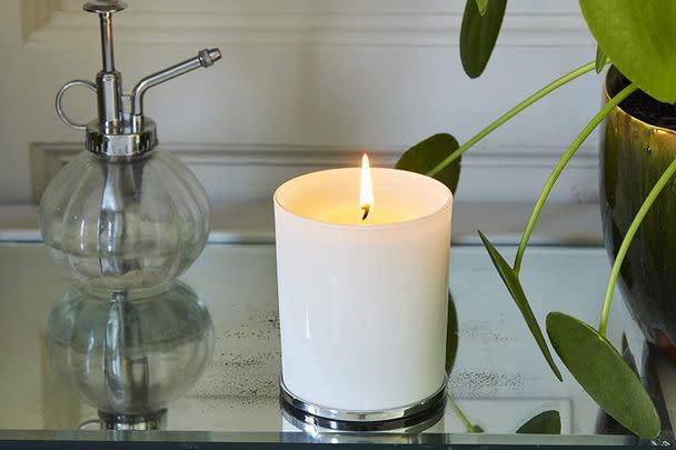 If you have trouble settling down for bed, get your hands on This Works aromatherapy candle and save 24%