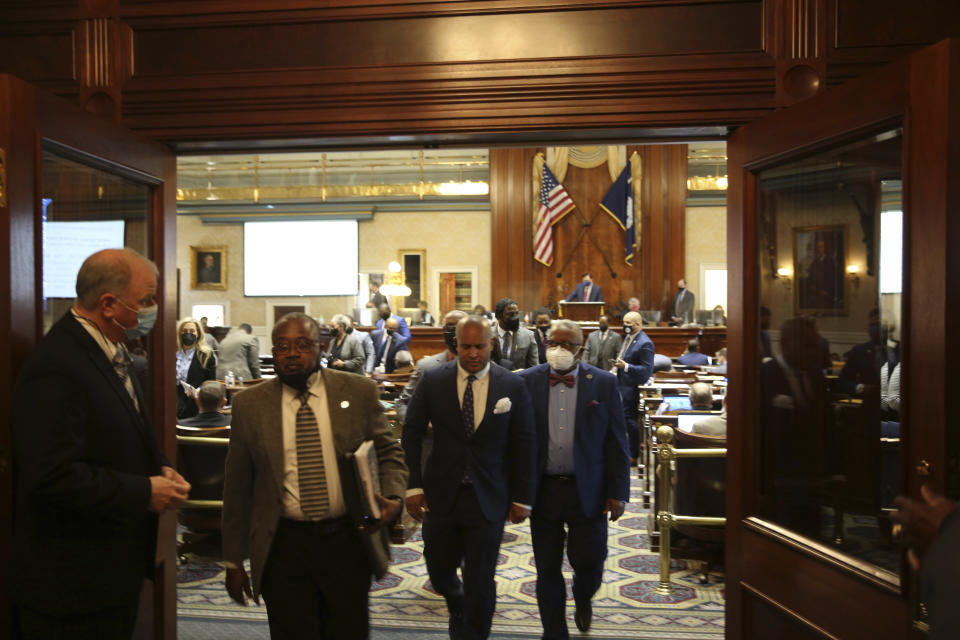 Black members of the South Carolina House walk out as an abortion bill is debated on Wednesday, Feb. 17, 2021 in Columbia, S.C. The House is expected to pass the bill that would ban nearly all abortions and send it to the governor's desk. (AP Photo/Jeffrey Collins)