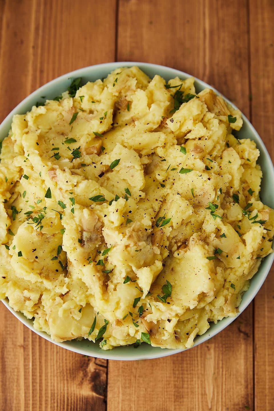 <p>Don't worry, they're still super creamy.</p><p>Get the recipe from <a href="https://www.delish.com/holiday-recipes/thanksgiving/a22657761/best-vegan-mashed-potatoes-recipe/" rel="nofollow noopener" target="_blank" data-ylk="slk:Delish" class="link rapid-noclick-resp">Delish</a>.</p>