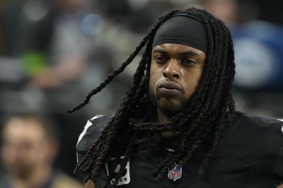 Las Vegas Raiders wide receiver Davante Adams (17) leaves the field against the Minnesota Vikings during the first half of an NFL football game, Sunday, Dec. 10, 2023, in Las Vegas. (AP Photo/Rick Scuteri)