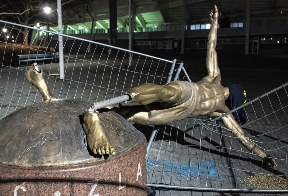 The damaged statue of soccer player Zlatan Ibrahimovic next to Stadion football arena in Malmo, Sweden, Sunday Jan. 5, 2020. Ibrahimovic, who recently joined Italian side AC Milan, angered fans of his boyhood club, Malmo, in November when he bought a stake in one of Swedish title rivals, Hammarby, and outlined his desire to make the Stockholm-based team “the best in Scandinavia". (Johan Nilsson/TT via AP)