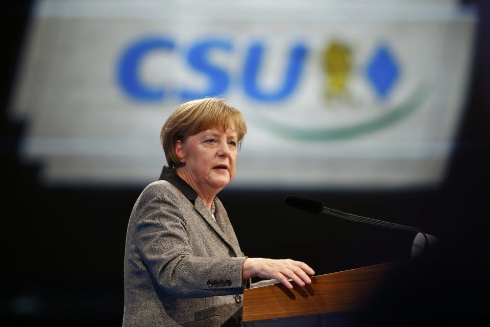 Angela Merkel, German chancellor and leader of the Christian Democratic Union party CDU addresses the delegates of the party congress of the CDU's sister party, Bavaria's Christian Social Union party CSU, in Nuremberg December 12, 2014. REUTERS/Michael Dalder (GERMANY - Tags: POLITICS)